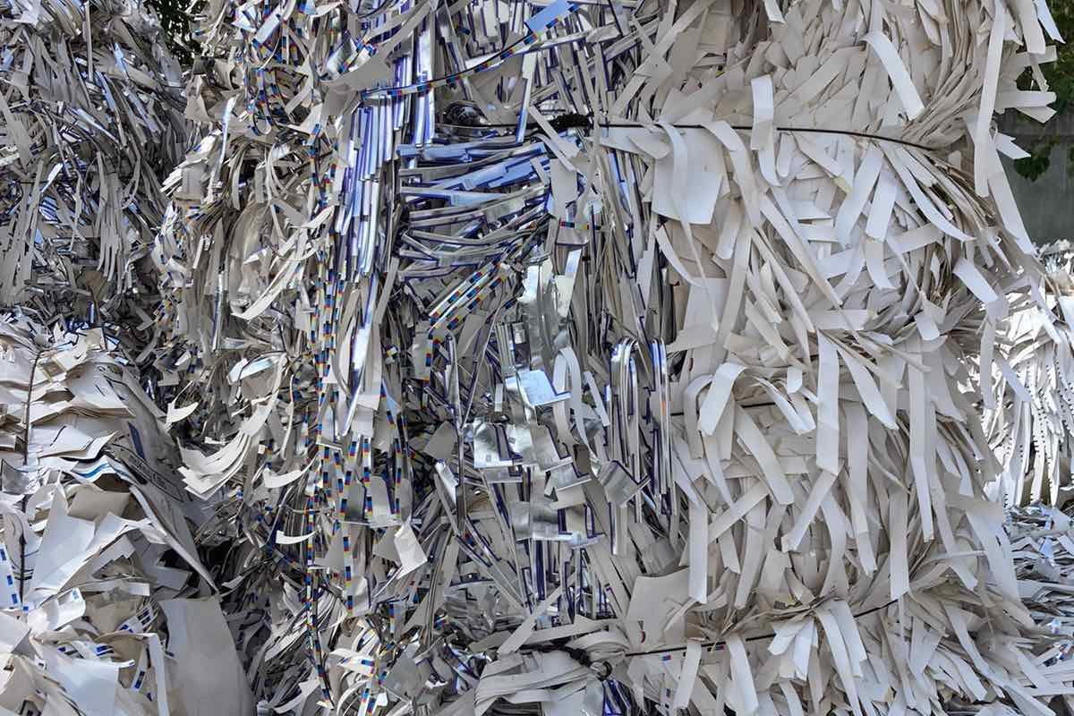 Baled laminated paper